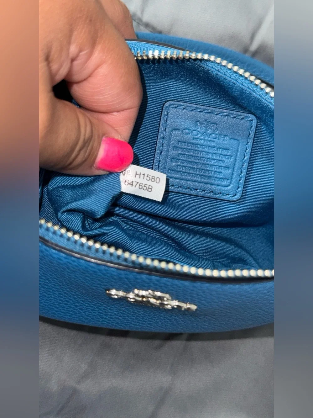 Coach Teal-Blue Faux-Shearling Leather Wristlet with Pom Charm